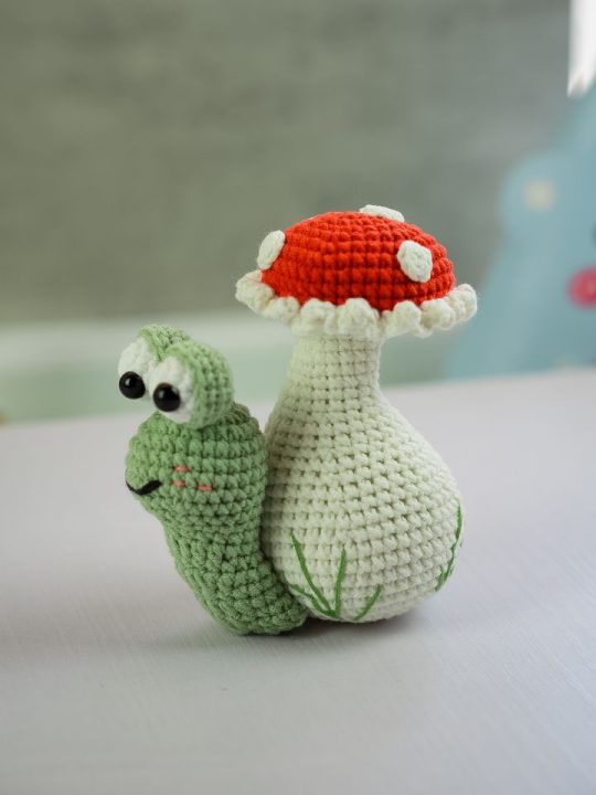 free crochet snail pattern little snail carrying mushroom